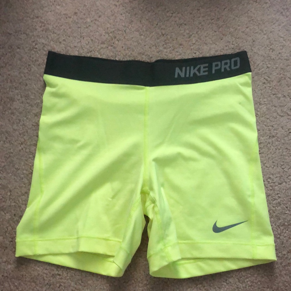 Neon yellow Nike Pro spandex